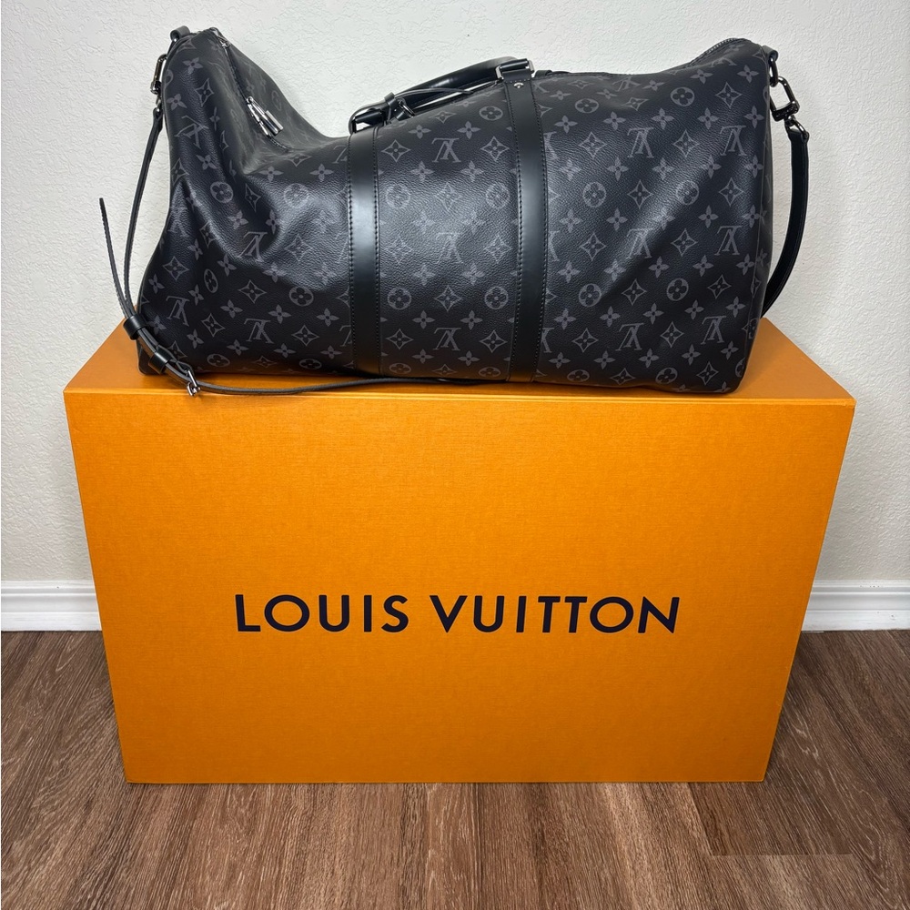 Louis Vuitton Black Duffel Bag with Iconic Monogram